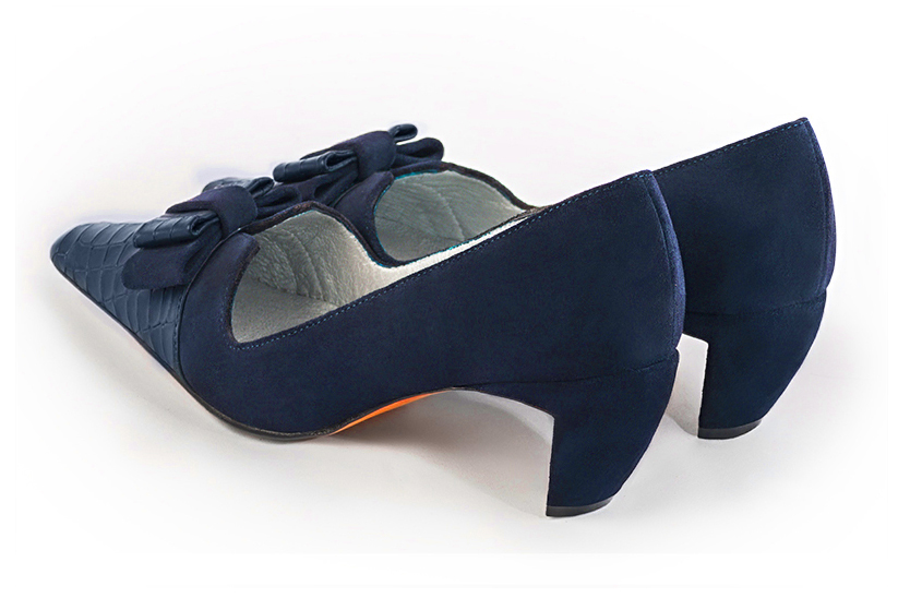 Navy blue women's dress pumps, with a knot on the front. Tapered toe. Medium comma heels. Rear view - Florence KOOIJMAN